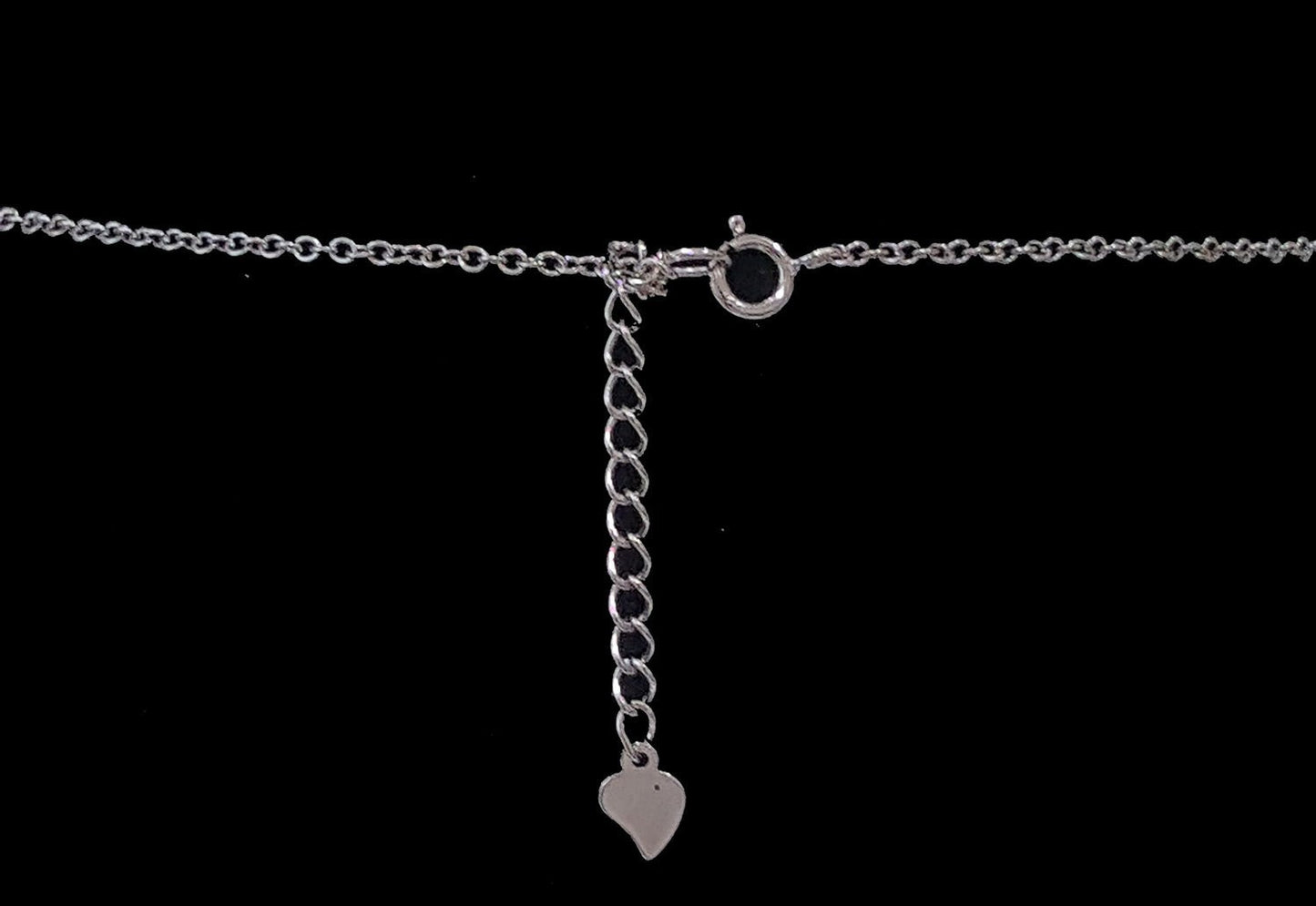 .925 Sterling Silver Wing with Cubic Zirconia and Dangling Heart Pendant SY82