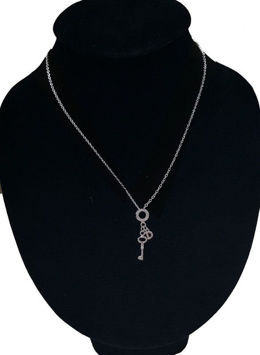 .925 Sterling Silver Key with Cubic Zirconia and Dangling Letter D Pendant SY83