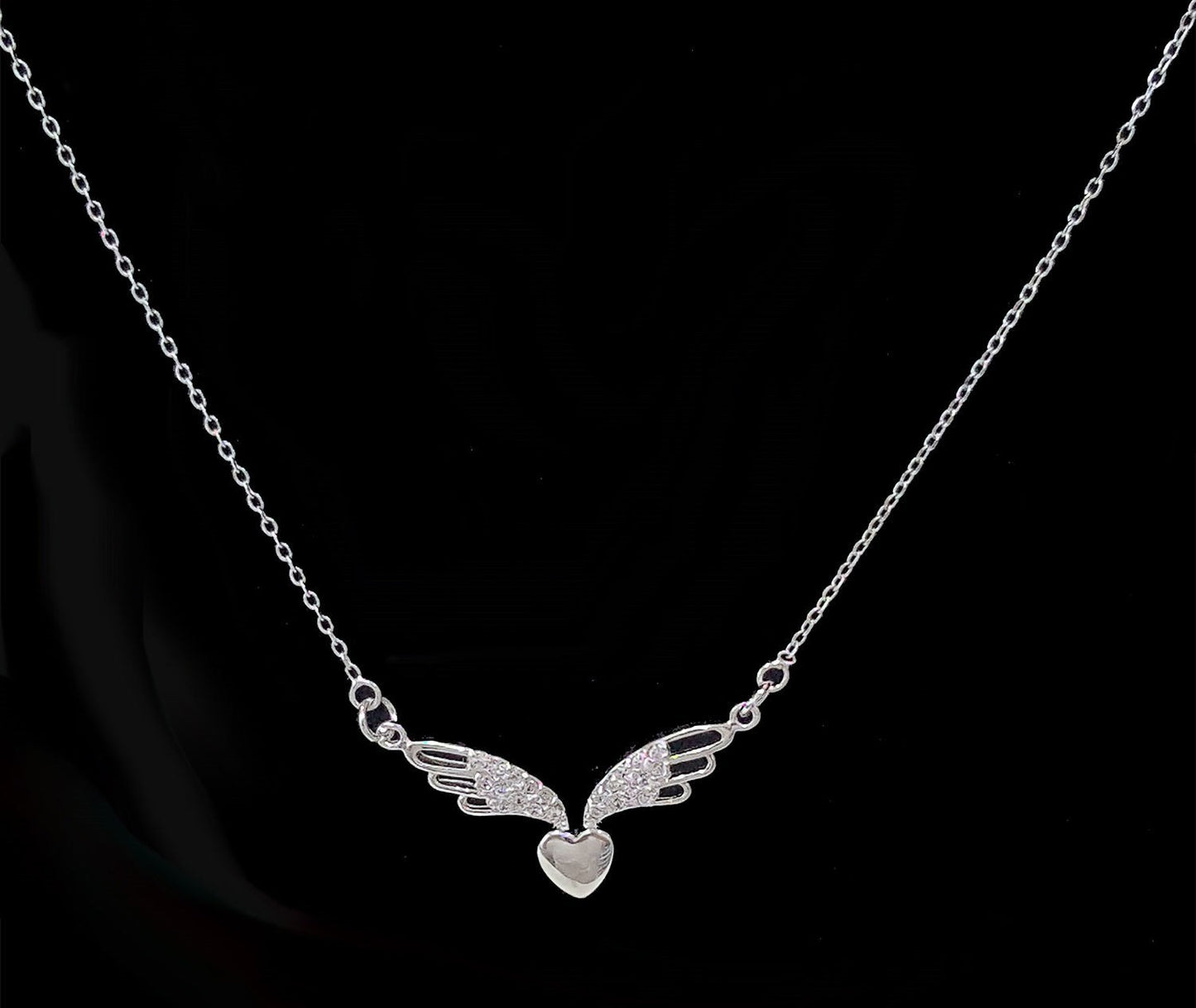 .925 Sterling Silver Heart with Silver and Cubic Zirconia Wings Pendant SY85